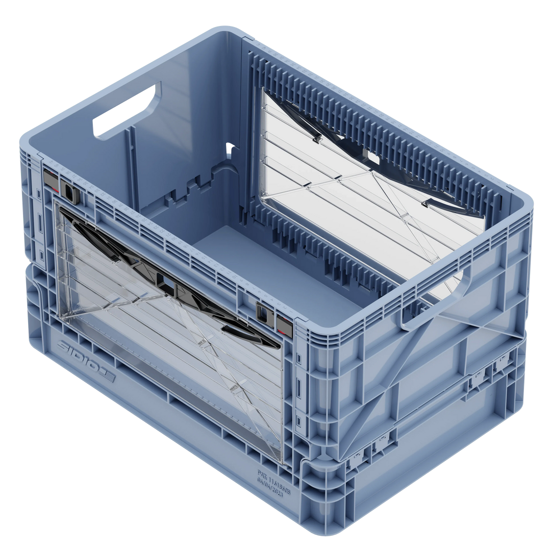 Blue SidioCrate collapsible storage crate for camper van window mounting.