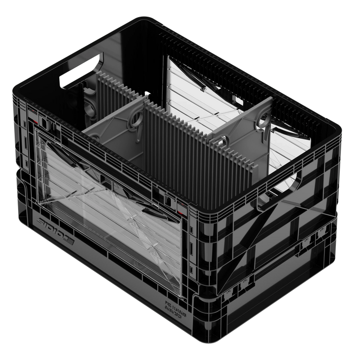 Black SidioCrate collapsible storage crate for camper van window mounting.