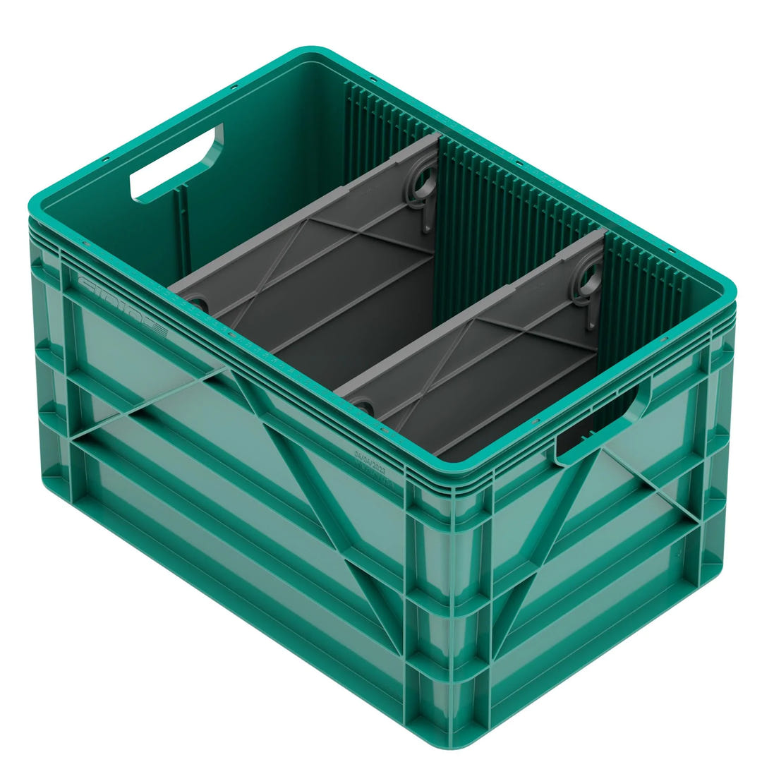 Green SidioCrate heavy-duty plastic storage crate for camper van organization.