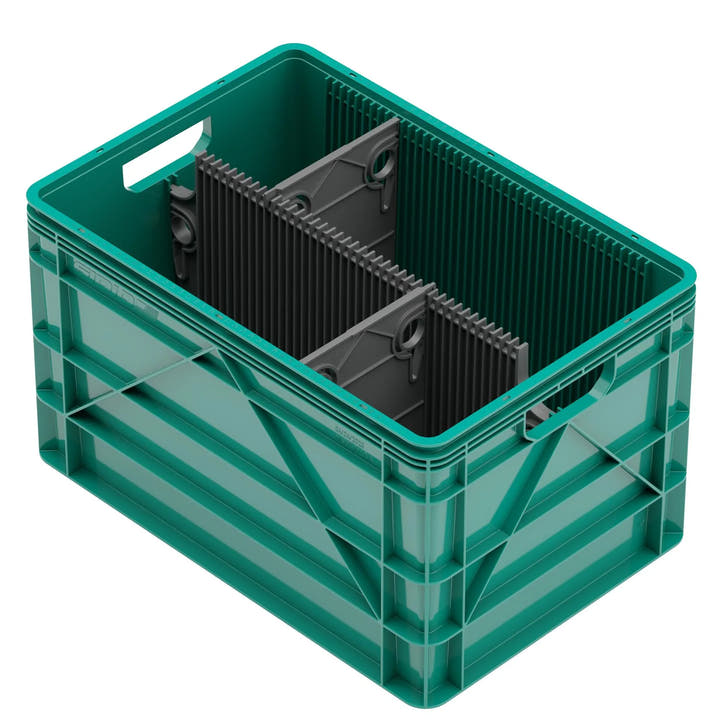 Full size SidioCrate green plastic storage bin with grey internal dividers for camper van organization.