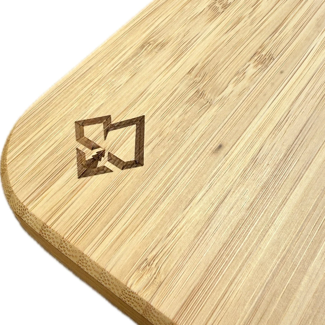 Close-up of a Weekender Outdoors slim folding bamboo Lagun table for camper vans and RVs.