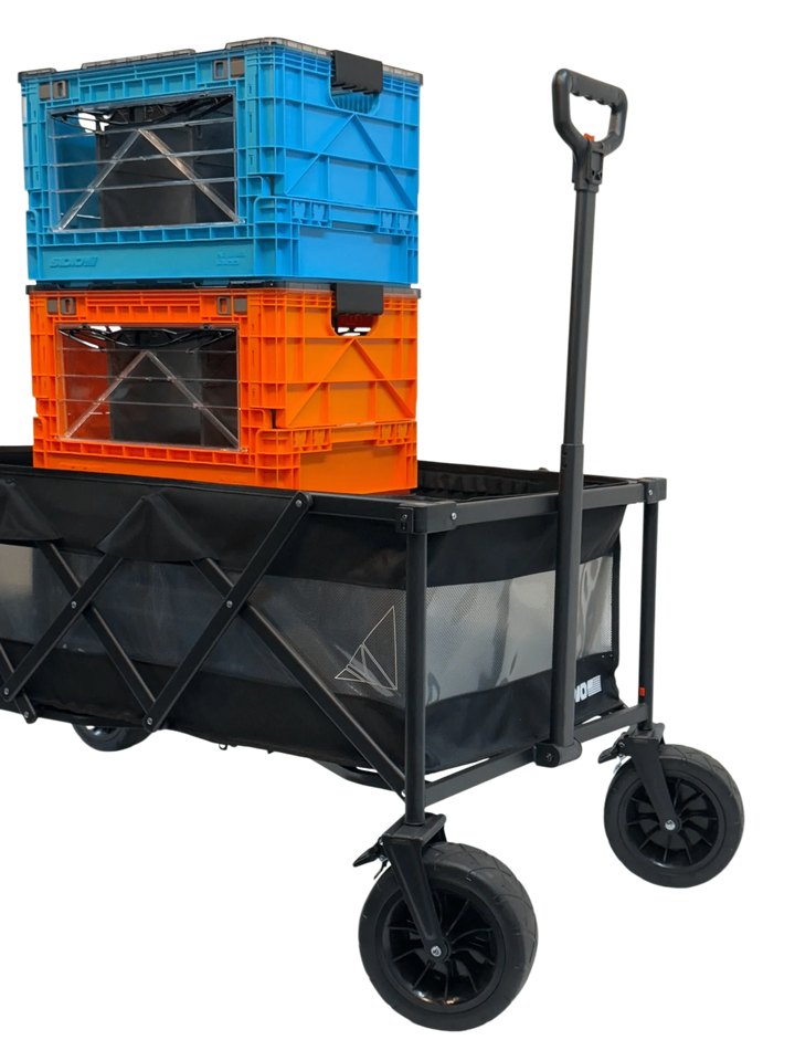 Two SidioCrate windowed storage crates, one blue and one orange, stacked inside a black collapsible utility wagon.