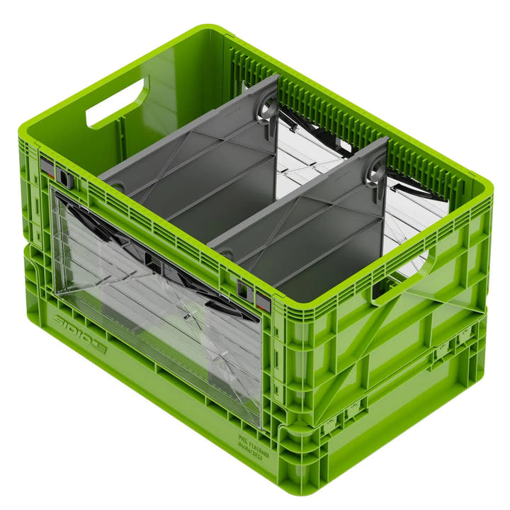 Green SidioCrate collapsible storage bin with clear window for camper van organization.