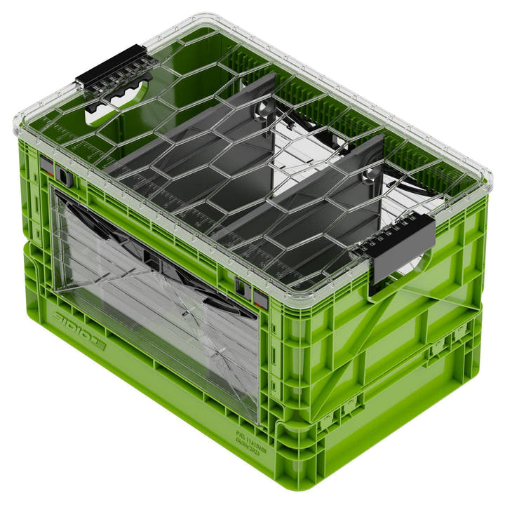 Green SidioCrate collapsible storage crate with clear window for camper van organization.