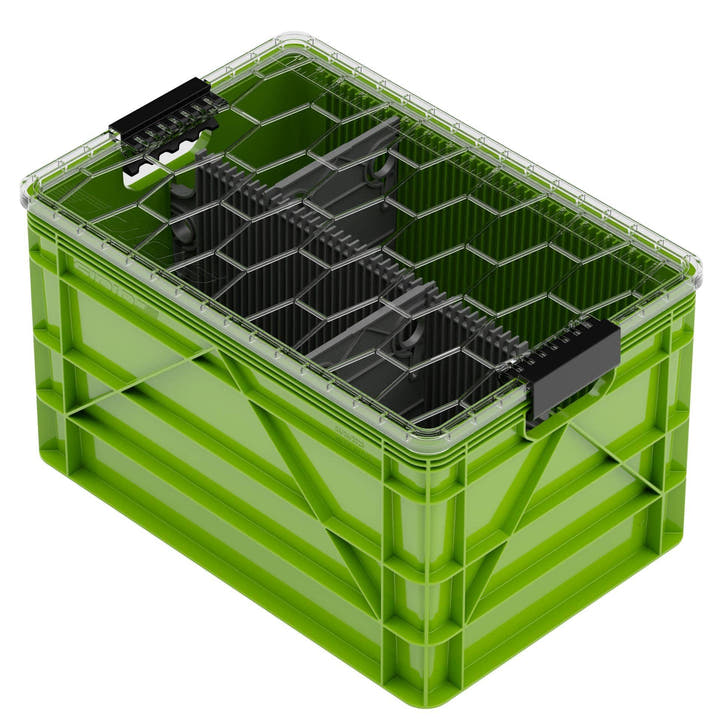 Green SidioCrate storage bin with black internal dividers for camper van organization.