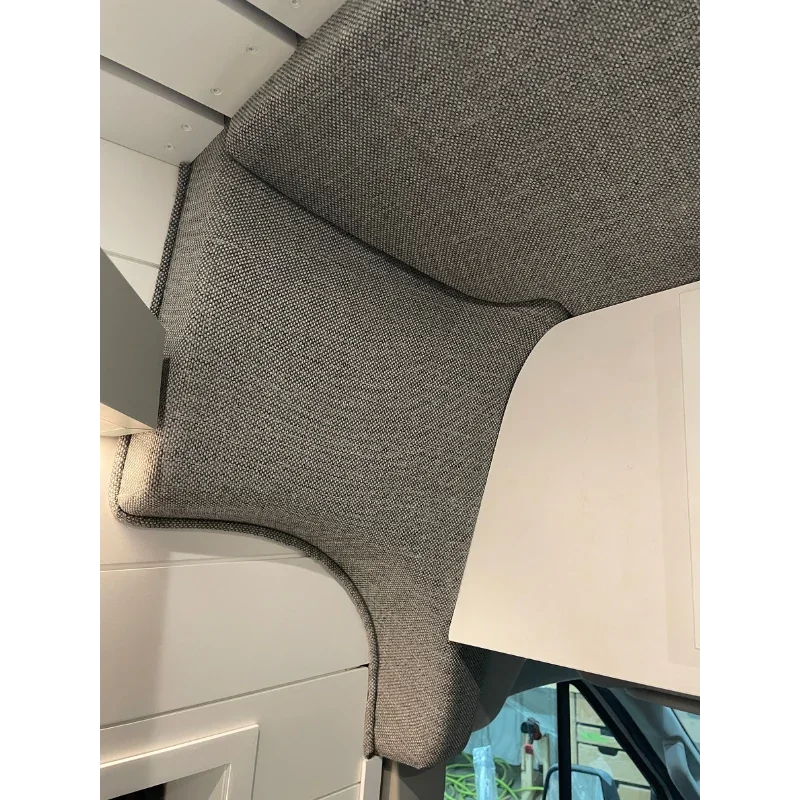 Grey fabric GoCode B pillar cushion for Ford Transit high roof camper van.